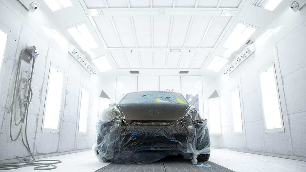 car in spray paint booth with AdvanceCure