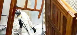 Spraying in an Enclosed Finishing Paint Booth