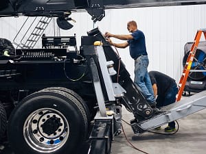 Men working on Heavy Duty Truck