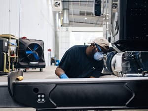 Man working on heavy duty truck