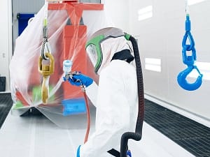 Man Spray Painting parts