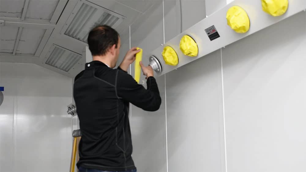 Cover Cure Towers, Signage & Sprinklers in Your Paint Booth