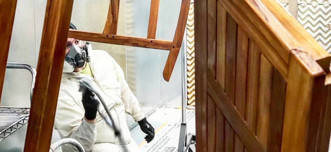 Spraying in an Enclosed Finishing Paint Booth