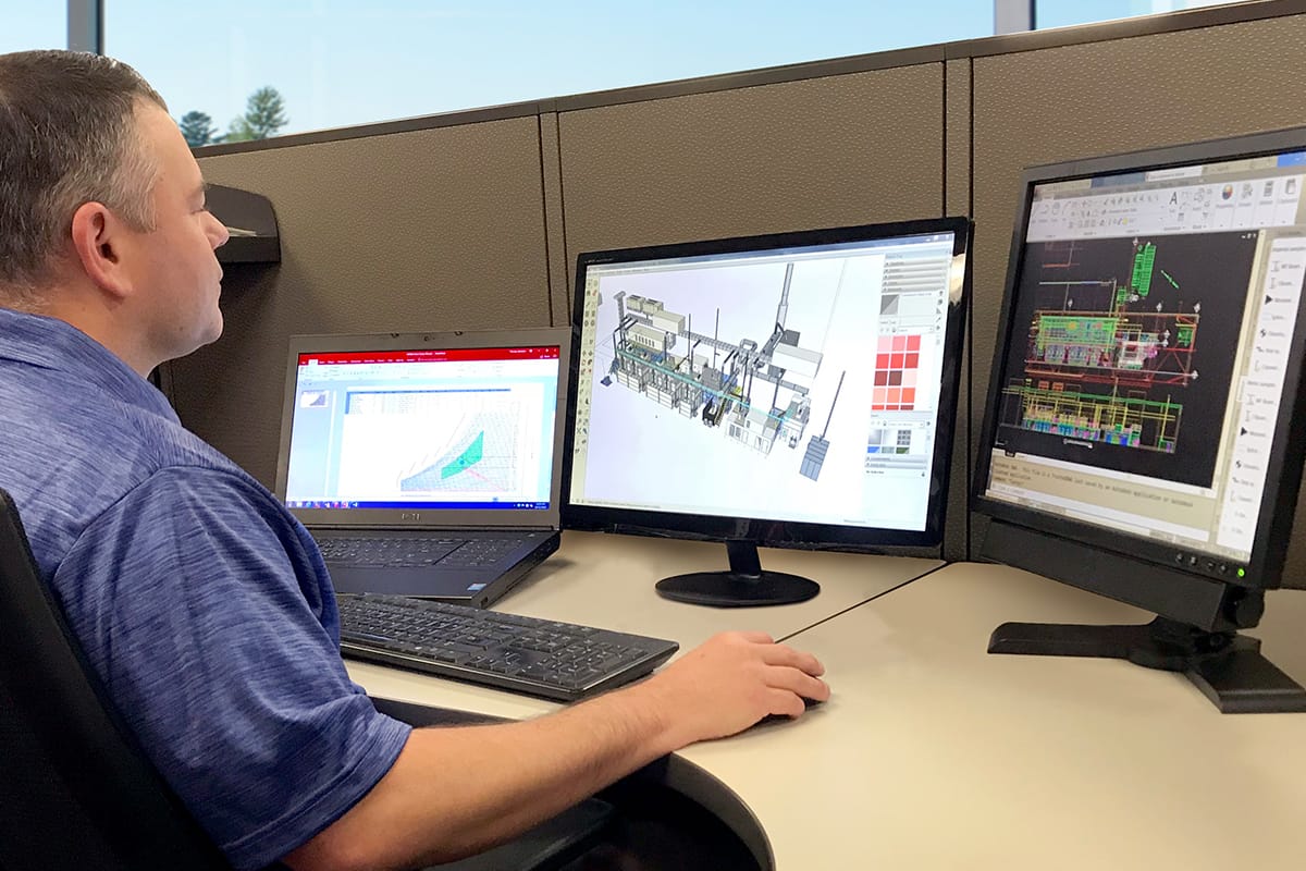 GFS Engineer working on plans for large paint booth installation