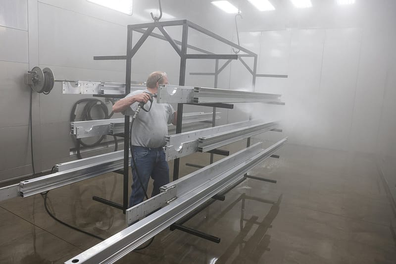 Washing parts in GFS Wash booth before powder coating in GFS Powder booth