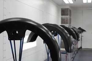 parts being painted in spray booth