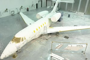 GFS commercial aircraft prep booth with jet inside