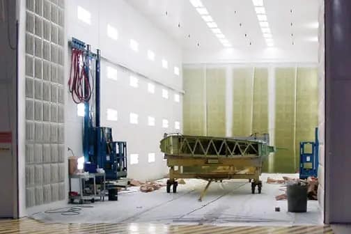 Aircraft wing inside a GFS aerospace parts booth