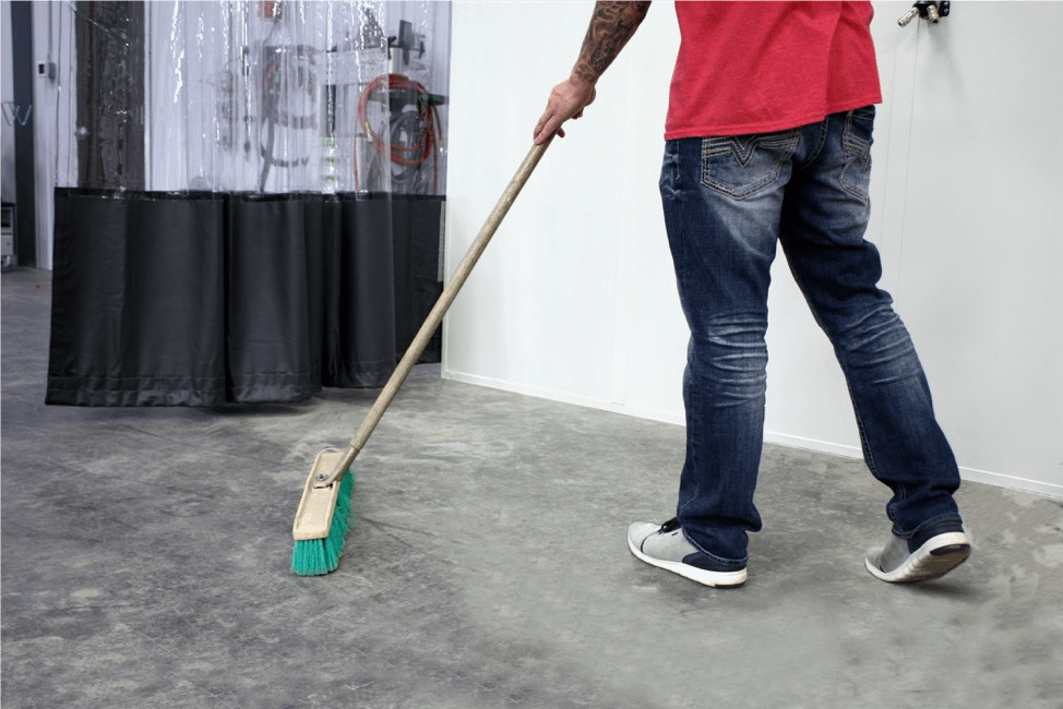 Sweep & Vacuum Any Residue from Your Paint Booth