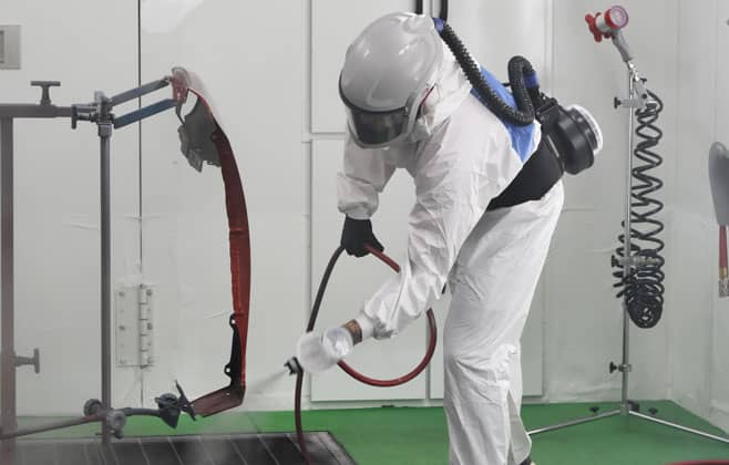 proper attire while spraying inside a paint booth